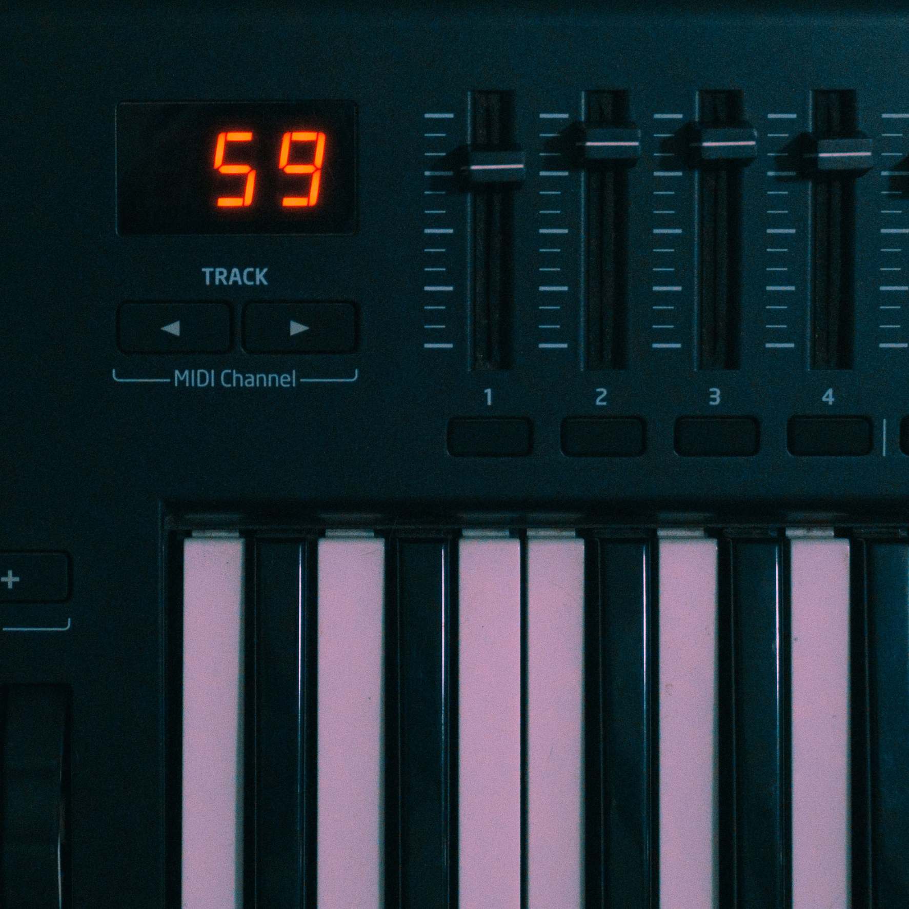Close view of a keyboard and monitor on a work desk