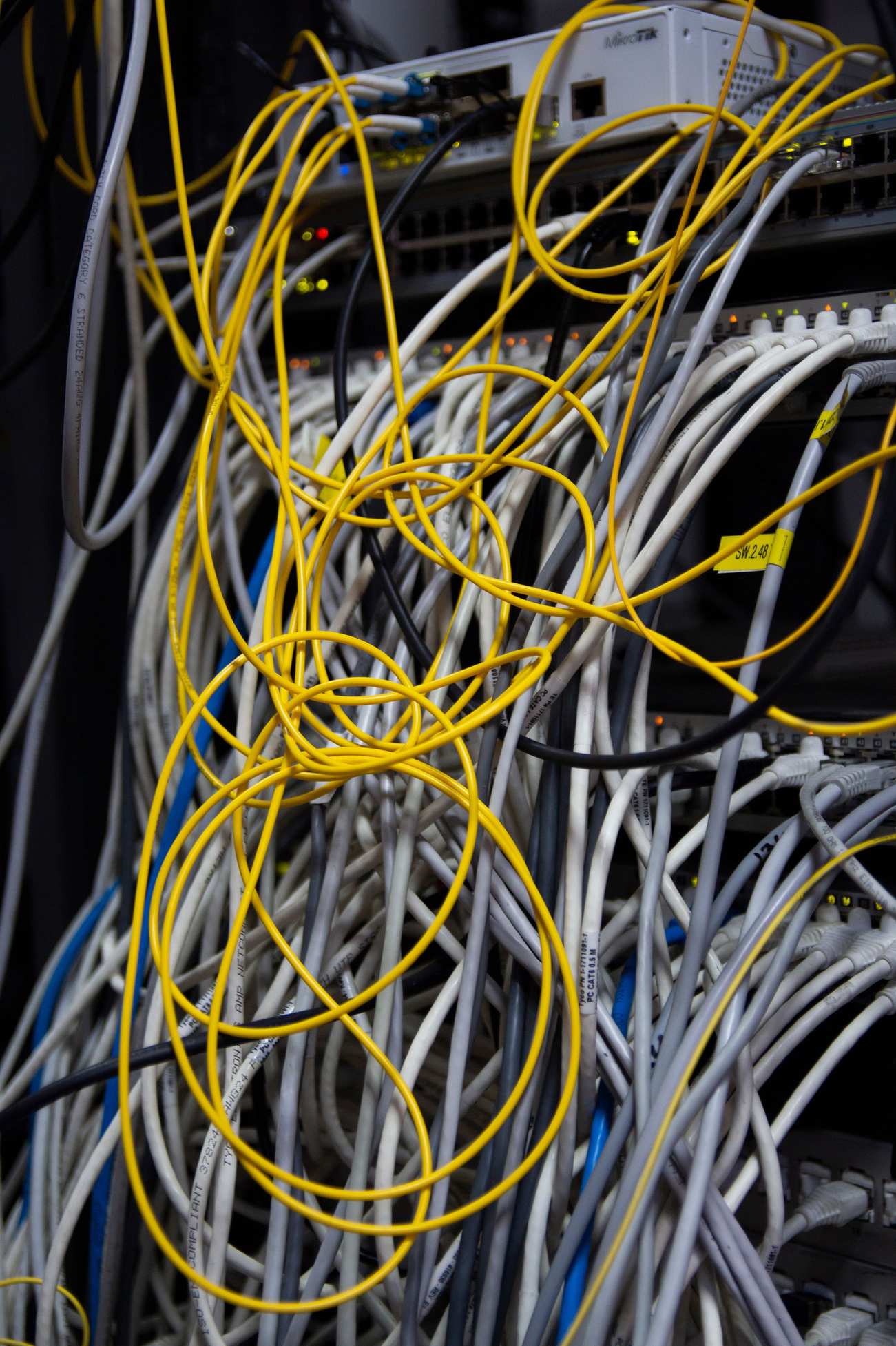 Network cables and server hardware in a rack